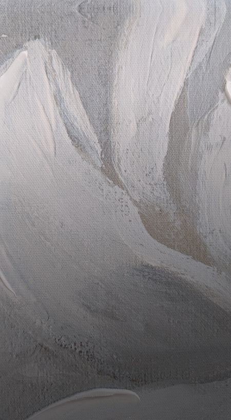 Abstract gray and white textured painting.