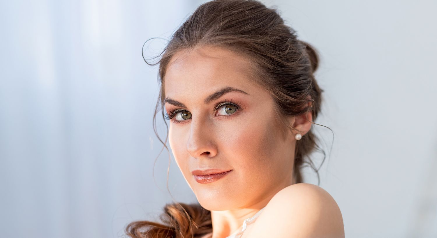 Portrait of a woman with stunning green eyes.